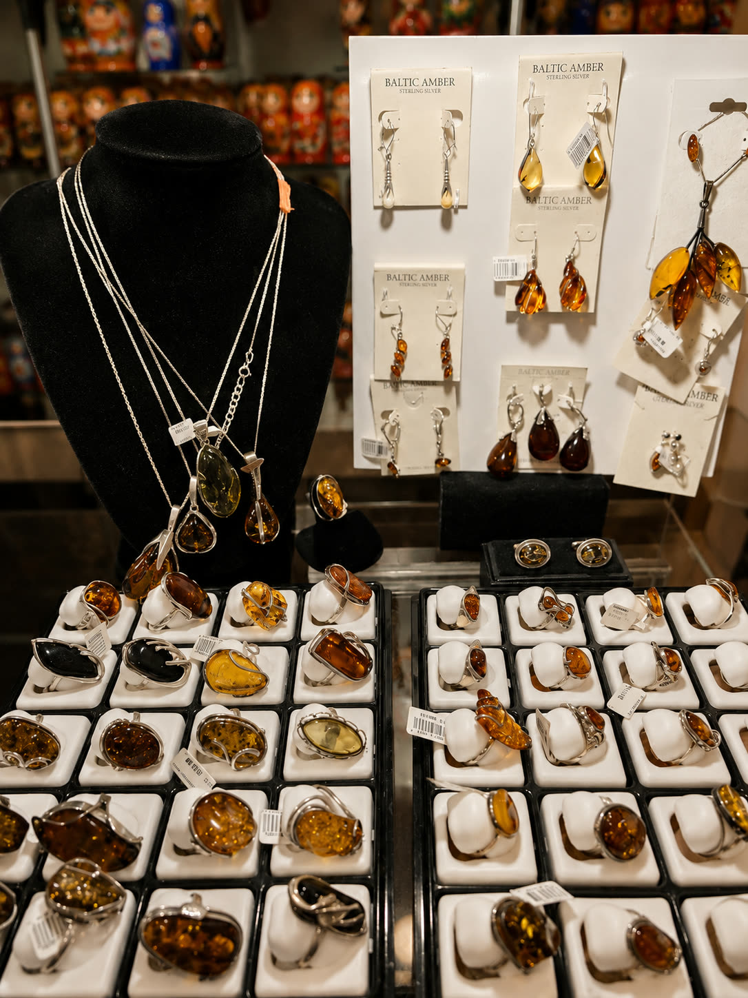 Imported amber jewelry — necklaces, rings, and earrings
